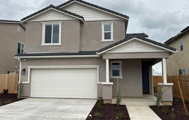 Be the first to live in this beautiful two-story home in RIVERSTONE