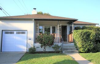 Charming 2 Bed/1 Bath House with Yard and Attached Garage Available Now!