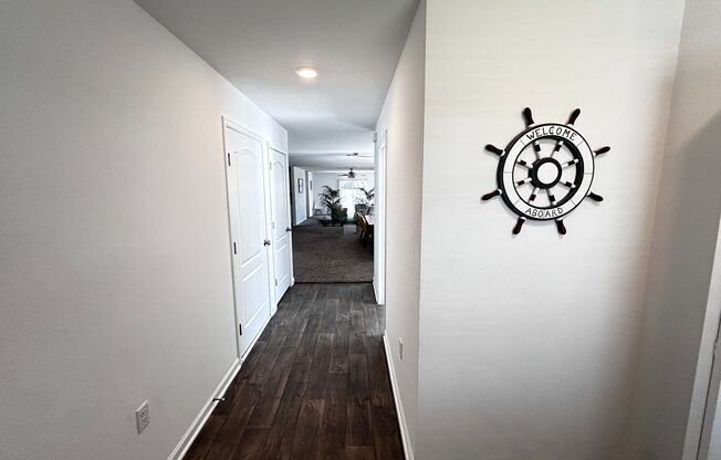 Picturesque Waterfront 4-Bedroom Home with Premium Amenities + 3 Car Garage! Community Amenities!