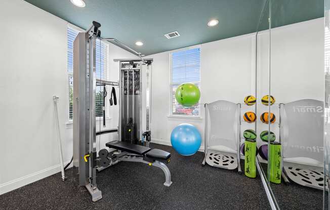 fitness room with exercise equipment