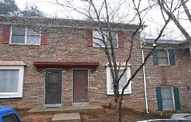 A charming and well-maintained 2-bedroom, 1.5-bath unit