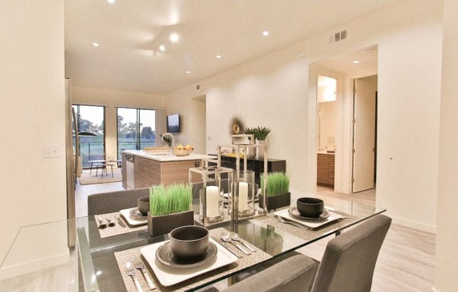 Scottsdale, AZ Apartments - Open-Concept Dining Room with Wood Flooring, Overhead Lighting, and Seamless Access to Kitchen