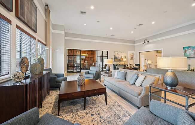 a living room with couches and a coffee table