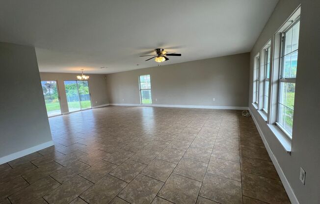 $1,795 ** AVAIL 7/15/25 ** 3 Bed / 2 Bath Single Family Home on the Canal ** Large Fenced in Yard on the Water
