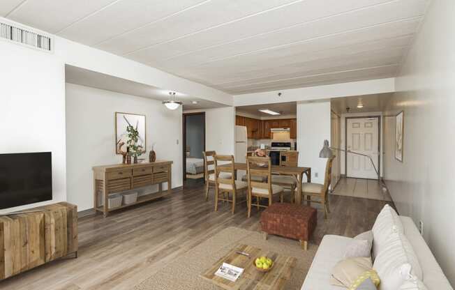 Living Room and Dining Room Layout With Window And Tables And Chairs, Highland Plaza Apartments, Pittsburgh, PA.