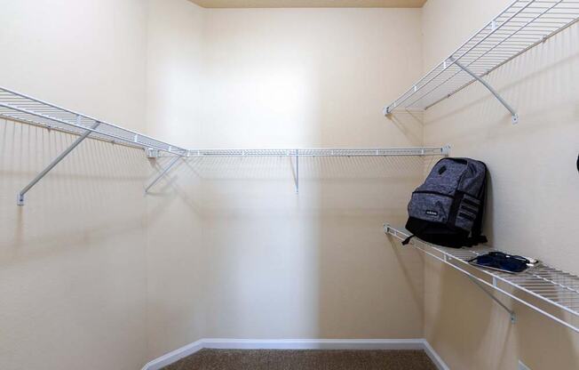 a walk in closet in a bedroom plus den unit  at Cabana Club - Galleria Club, Florida, 32256