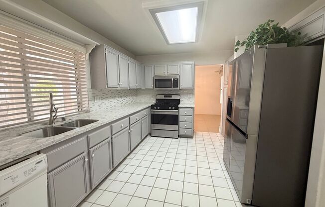 Spacious 4-Bedroom Home with 3-Car Garage in Orchards of Las Vegas
