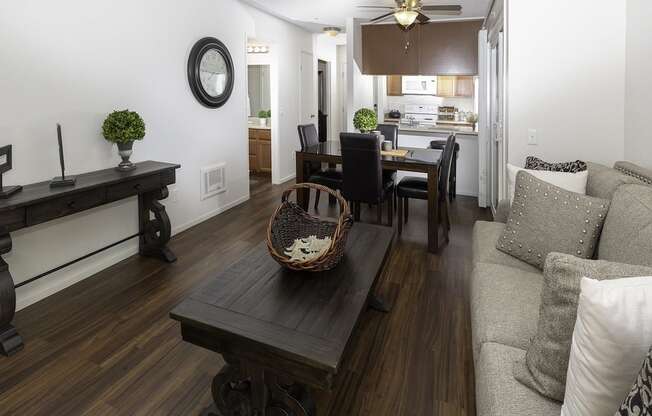 Living Room with Kitchen View at Eucalyptus Grove Apartments, California