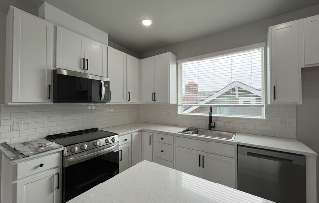 Luxury Living with Granite Counters & Stainless Steel Appliances