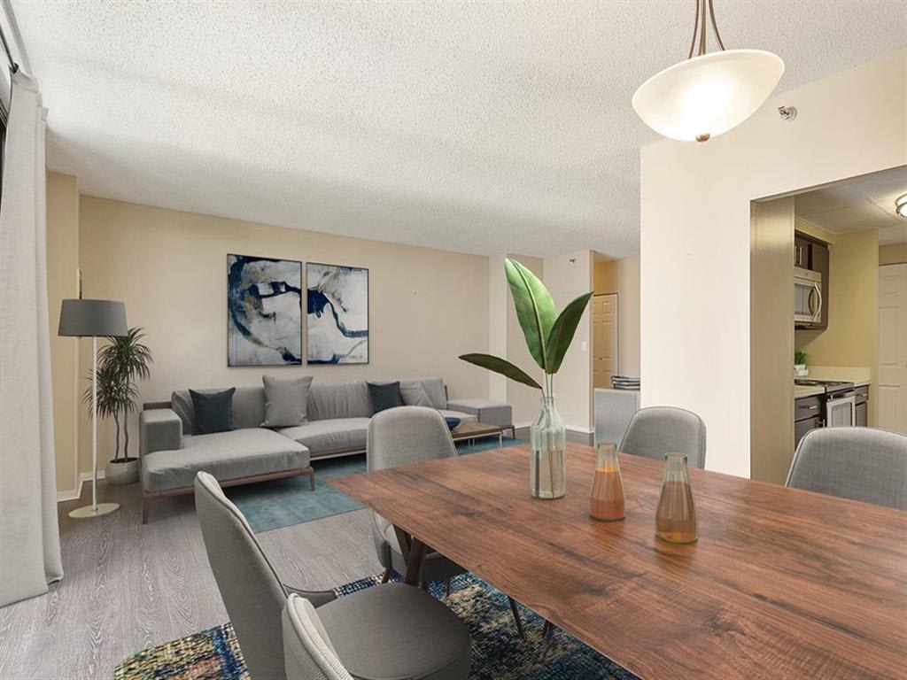 Spacious modern living room with L-couch and dining table for 6, at Prospect Place, New Jersey