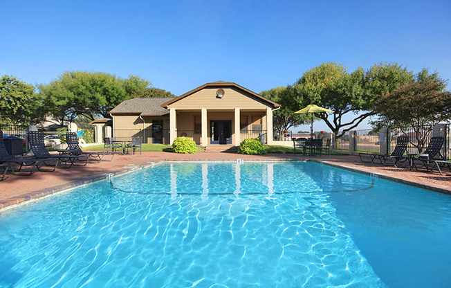 Pool and lounge chairs at GEORGETOWN PARK, Texas