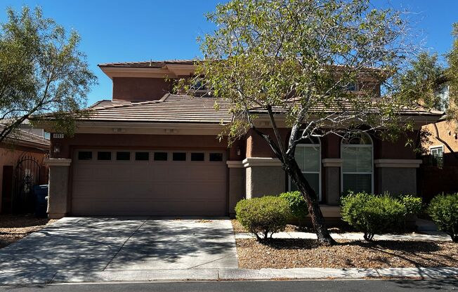Spacious 4-Bedroom Mountains Edge Home with Downstairs Suite, Balcony & Covered Patio