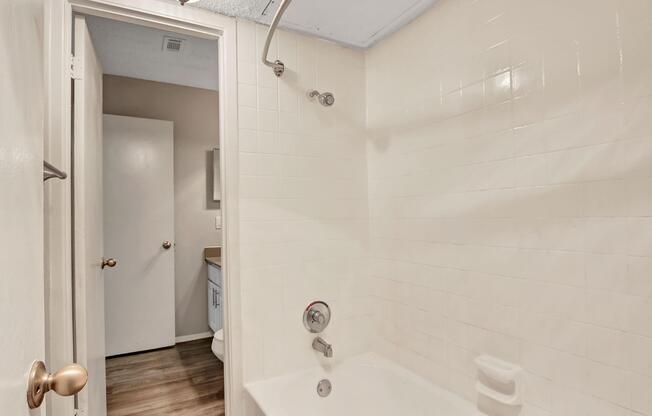 a close up of a shower in a small room