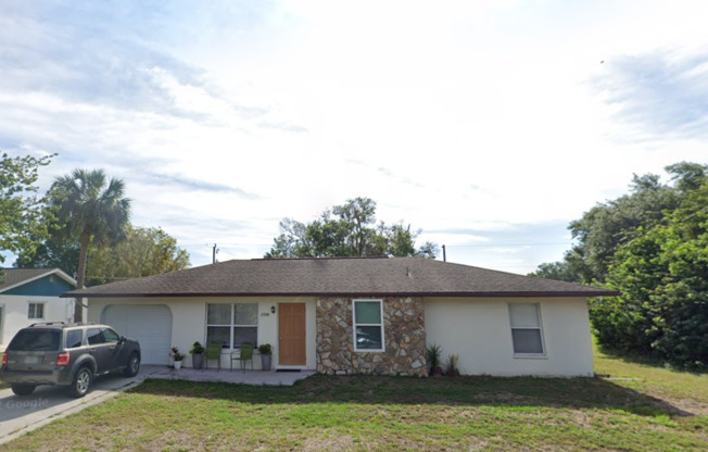 Charming 3BR/2BA Home with Screened Lanai and Garage