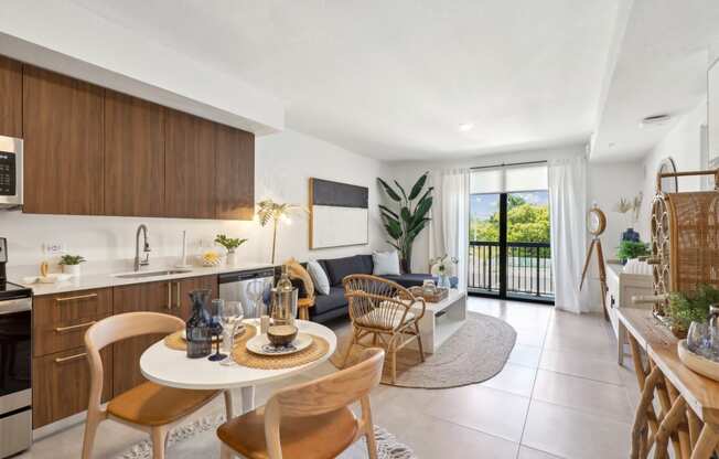 Kitchen and Living Room in A1 Floor Plan at Westgate on University in Lauderhill, FL