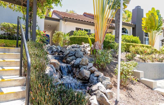 Outdoor waterfall at Eucalyptus Grove Apartments California