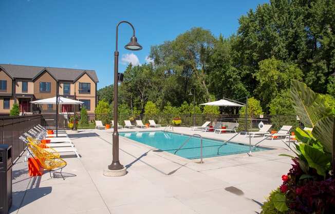 Relaxing Pool Area With Sundeck at The McMillan, Shoreview, MN, 55126