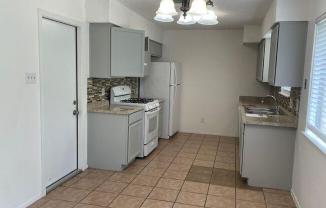 Discover comfort and convenience in this charming single-story home!