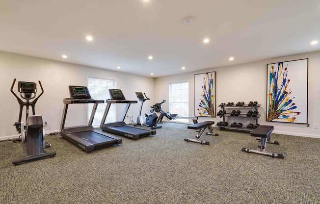 our apartments have a gym with a treadmill and elliptical machines at Station JTown, Louisville