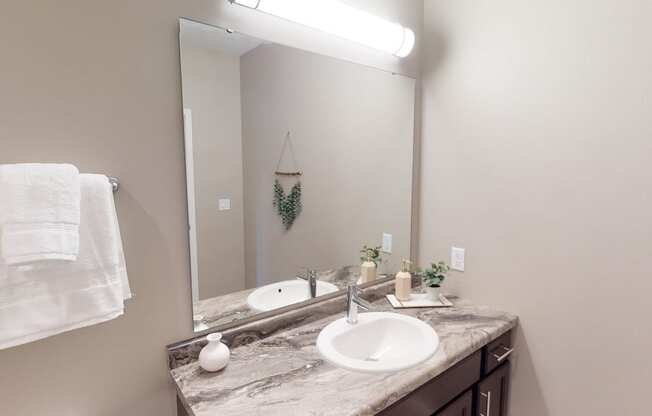 Bathroom With Vanity Lights at The Haven on Veterans, North Dakota, 58104