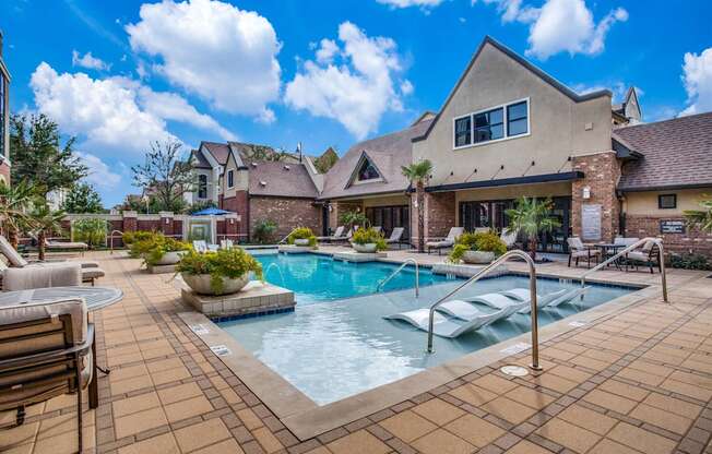 Resort style pool with lounge seating
