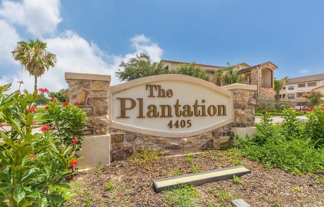 a house that has a sign on the side of a building