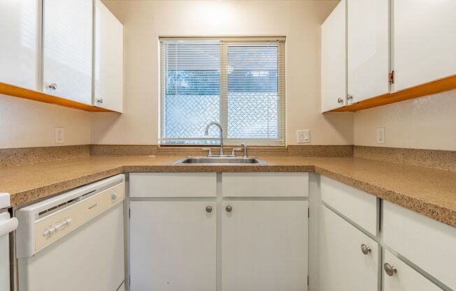 City living with views and walkable access to shops and restaurants!