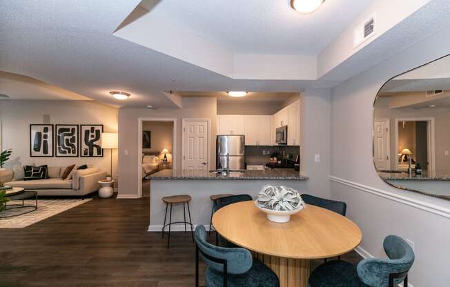 a living room and kitchen with a table and chairs at Willowest in Lindbergh, Atlanta, GA