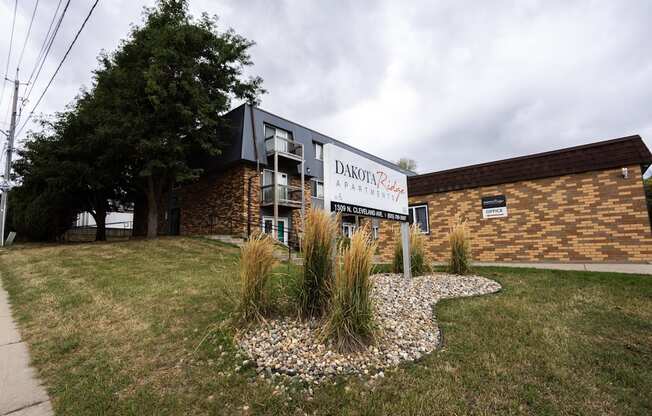 the front of a brick building with a sign that reads dasher park
