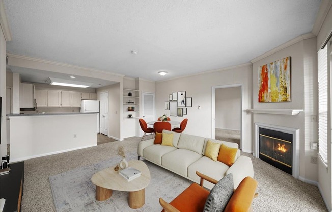 A living room with a fireplace and a couch.