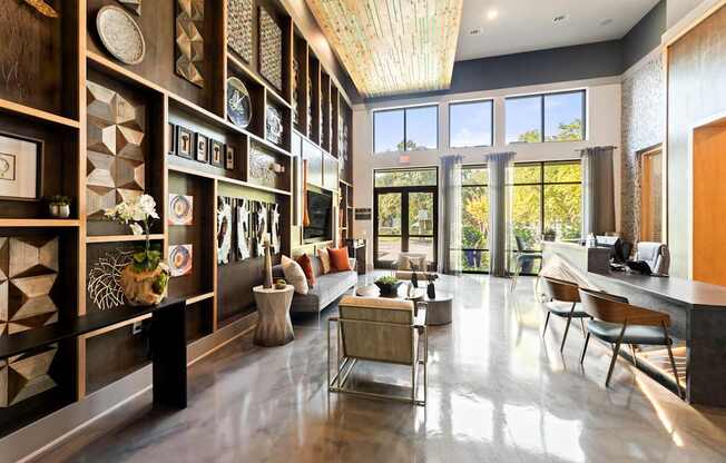 A modern living room with a long wooden shelf on the wall.