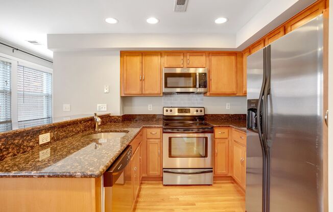 Stylish Condo in Hill East - Parking Space Included!