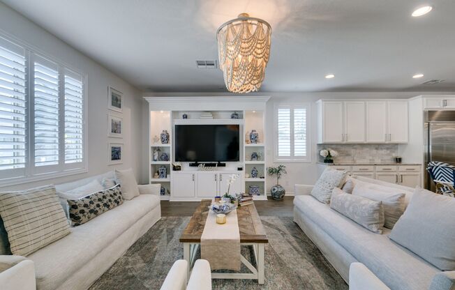 FULLY FURNISHED- Elegant 4-Bed, 3.5-Bath Home with Loft, Designer Finishes, and Expansive Backyard