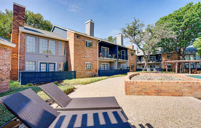 our apartments offer a courtyard with tables and chairs