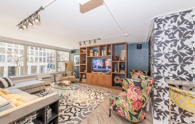 a living room with a couch and a tv