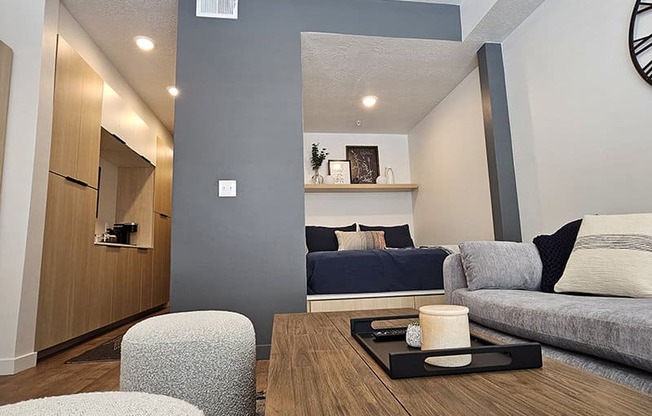 a studio apartment with a bed at Lotus Republic Apartments for rent in Downtown Salt Lake City, Utah