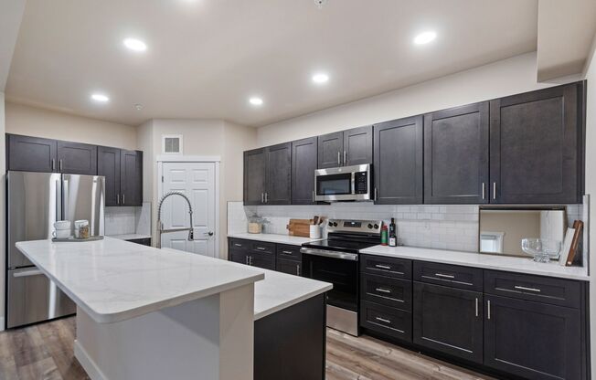 2 beds, 2 baths, 1,199 sqft, $1,750, Unit J-402