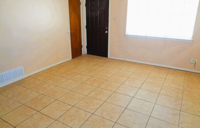 Cute Single Level Northeast Home With Refrigerated Air Located In Quiet Neighborhood