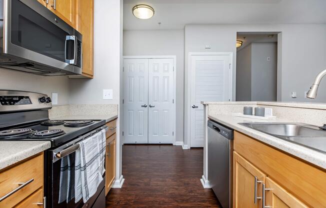 a kitchen with a stove and a sink
