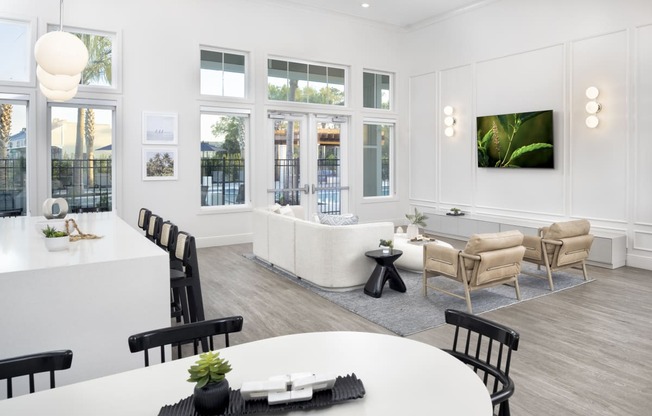 Club Room with Lounge Seating at Jackson Palms Affordable Apartments in Jacksonville FL