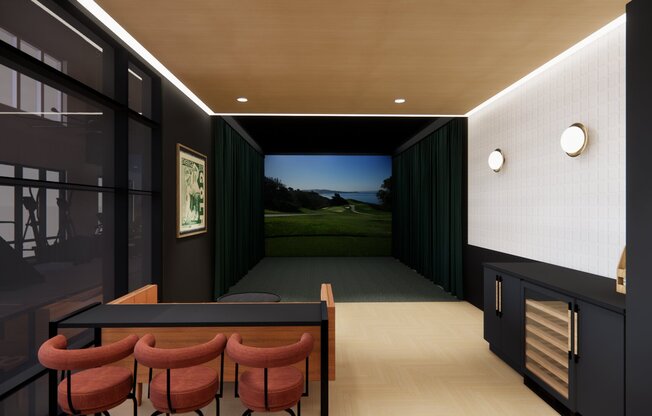 Multi-sport simulator lounge with comfortable seating at Modera Beaverton.