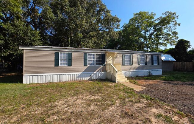 Nicely updated 3BR/2BA Mobile Home with large storage building