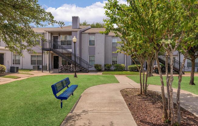 a large lawn in front of a building