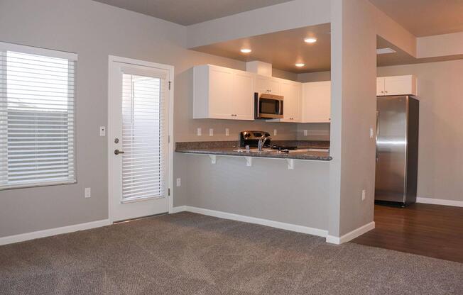 a kitchen with a sink and a window