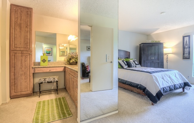 A bedroom with a bed, a desk with a chair, and a mirror.