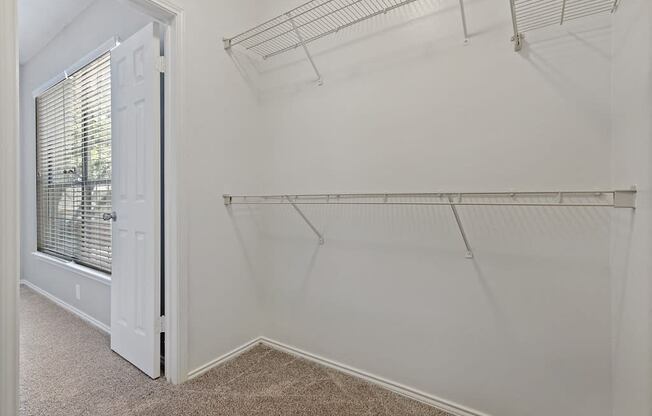 View into bedroom from walk-in closet