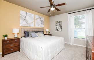 Falls at Eagle Creek apartments bedroom with ceiling fan