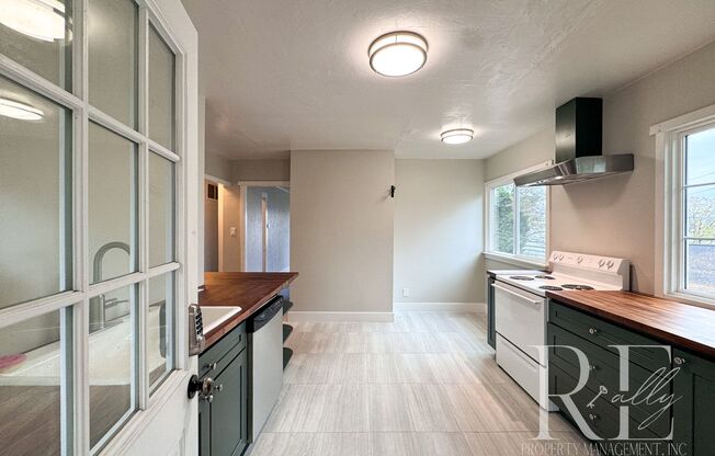 Charming Upper Unit with Modern Kitchen, Wraparound Layout & Walkable to PSNS
