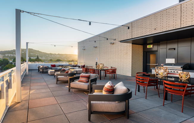 Rooftop lounge with grilling and dining stations