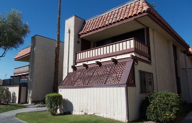 Charming Upstairs Condo with Private Balcony